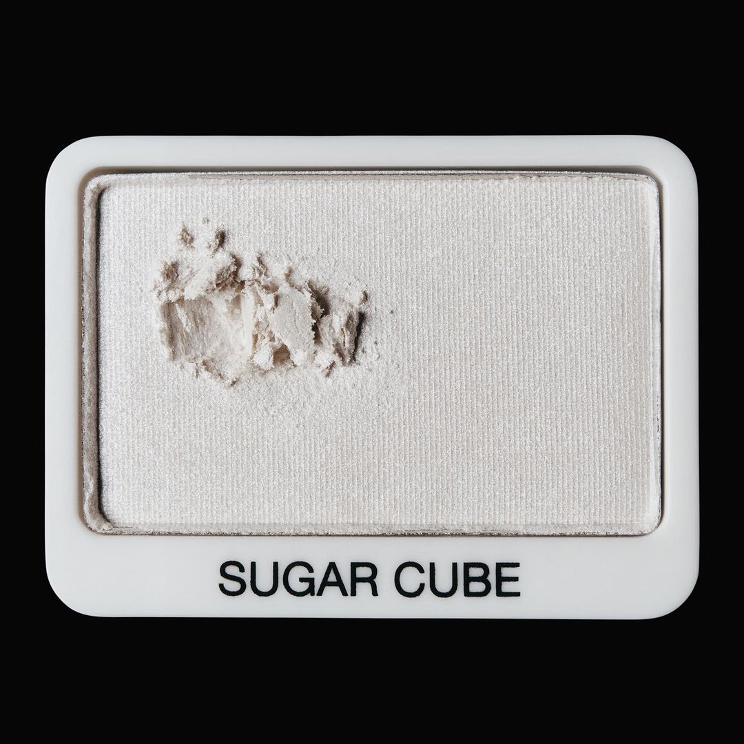 Eye shadow palette with white powder, close-up shot. Beauty and make-up concept for visual search and product discovery.