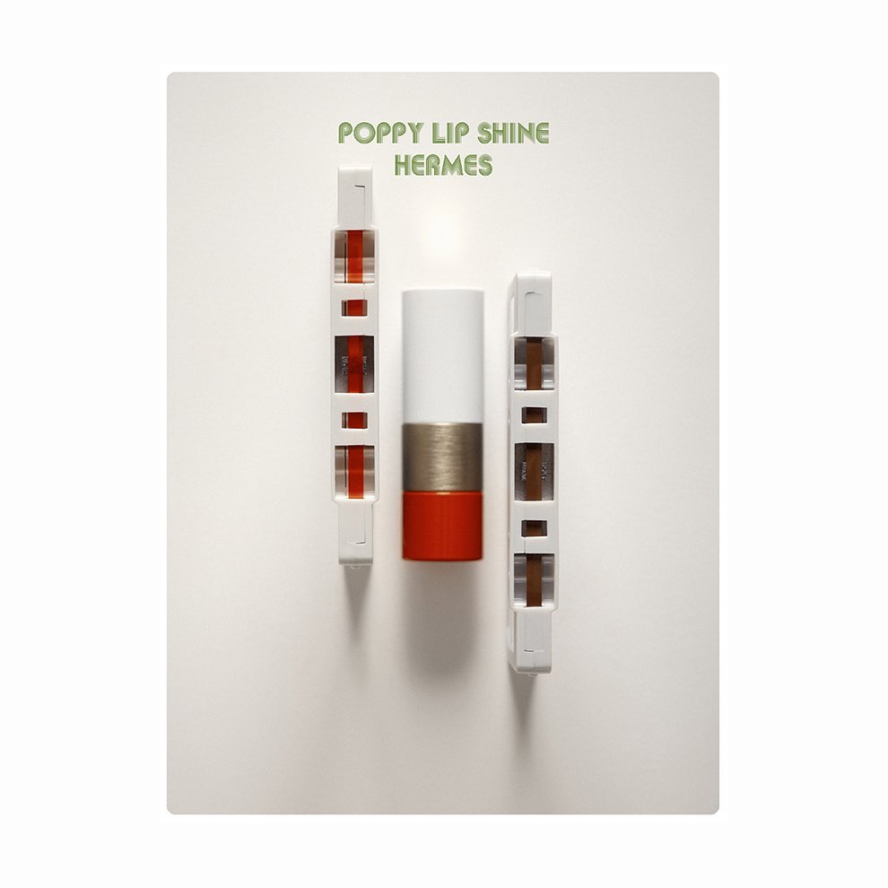 Hermes Poppy Lip Shine with white and red lipstick tube displayed on white backdrop with product packaging.