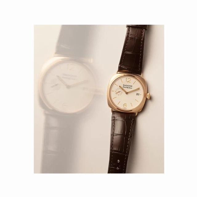 Elegant gold Panerai Radiomir watch with a dark brown leather strap, featuring a white dial, gold hands, and small date window.