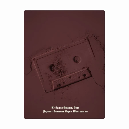 Vintage audio cassette tape artfully depicted with pigmented powder, showcasing a unique blend of retro media and artistic expression.