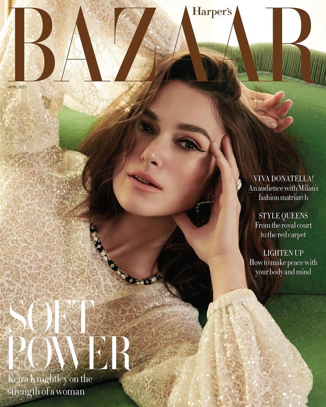 Magazine cover featuring Keira Knightley wearing a sparkling top, lying on green couch, looking at the camera. Harper's Bazaar cover.
