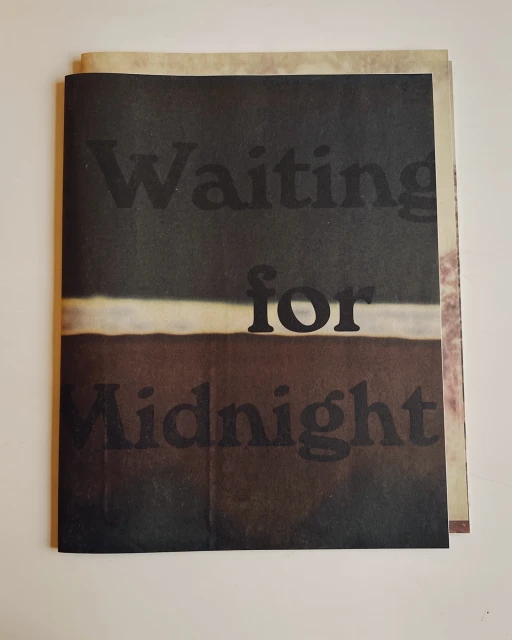 Artwork features 'Waiting for Midnight' text in dark shades with a light-colored horizontal line separating the words.