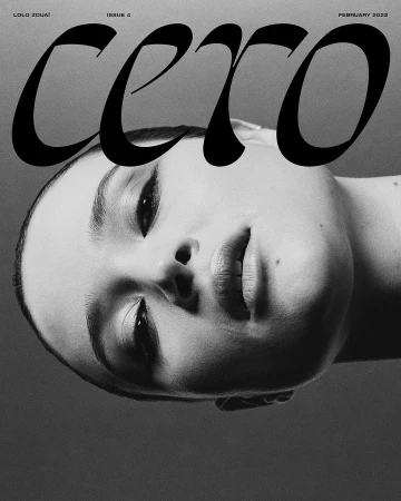 Close-up monochrome portrait of a woman looking upward against a grey background with bold typography reading CERO.