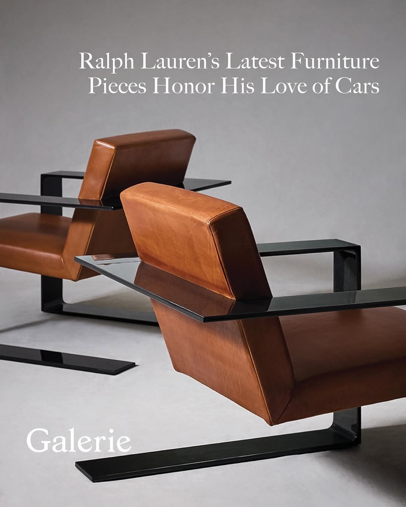 Two cognac-colored leather chairs with black frames and glass armrests are the dominant features against a gray studio backdrop.