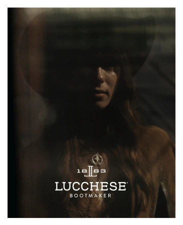 Portrait of a person wearing a cowboy hat in moody, low-key lighting with visible brand text LUCCHESE BOOTMAKER at the bottom.