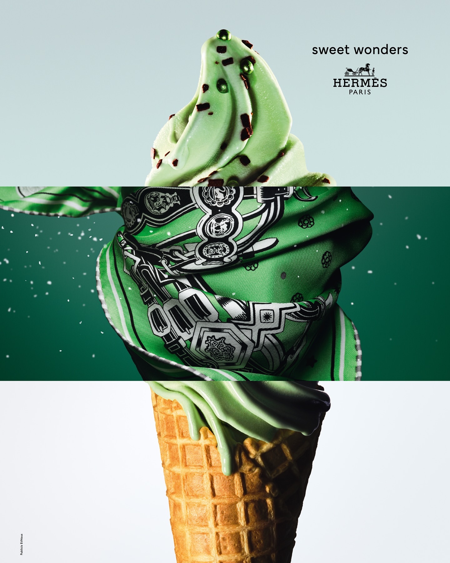 A stylized advertisement shows an ice cream cone, green scarf, and Hermès logo against a bright backdrop, promoting luxury fashion.