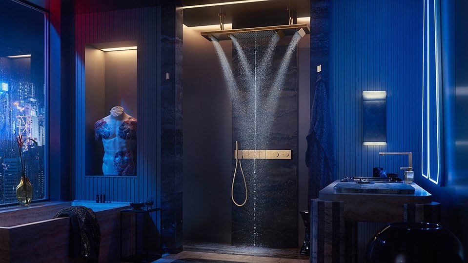 Modern bathroom interior featuring a luxurious shower with running water, marble surfaces, and blue lighting. Indoor residential setting.