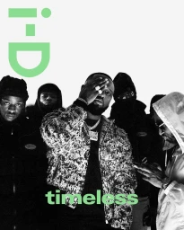 Black and white editorial portrait of a group of men posing against a light background with green i-D branding.