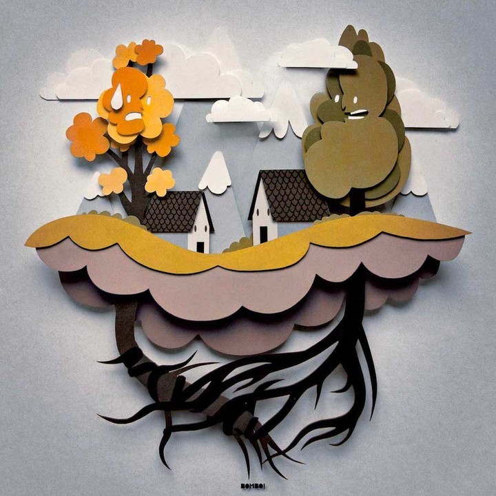 Paper art landscape with houses, trees, mountains, and layered clouds against a grey background in an illustration.