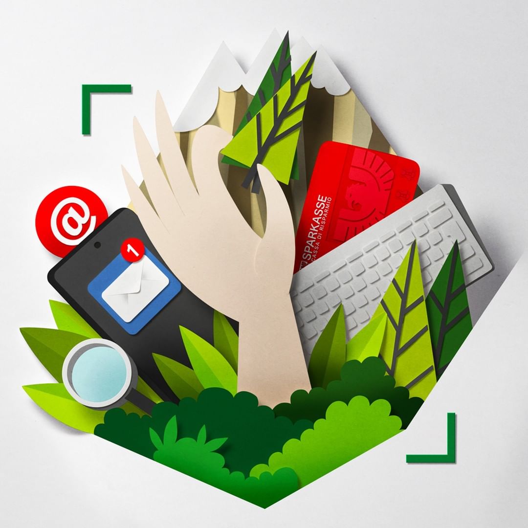 Conceptual digital art illustration of a hand with a smart phone, computer keyboard, credit card, trees, and mountains made from paper.