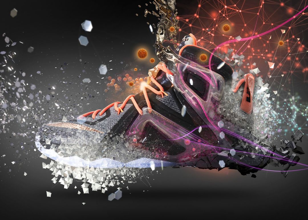 Black and grey athletic shoe, digital art with polygonal shards and streaming liquid, set against a dark background.