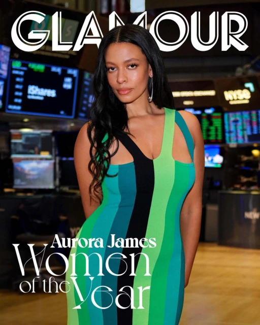 Glamour cover featuring Aurora James wearing a sleeveless color-blocked dress, posing in front of monitors displaying stock information.