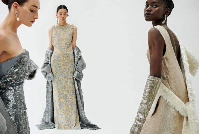 Three female fashion models in evening gowns and opera gloves against a white studio background by photographer Branislav Simoncik