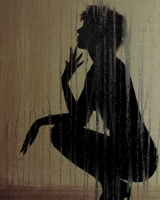 Silhouette of an adult female crouching in high heels, hand to face in a studio-like environment with an abstract background pattern.