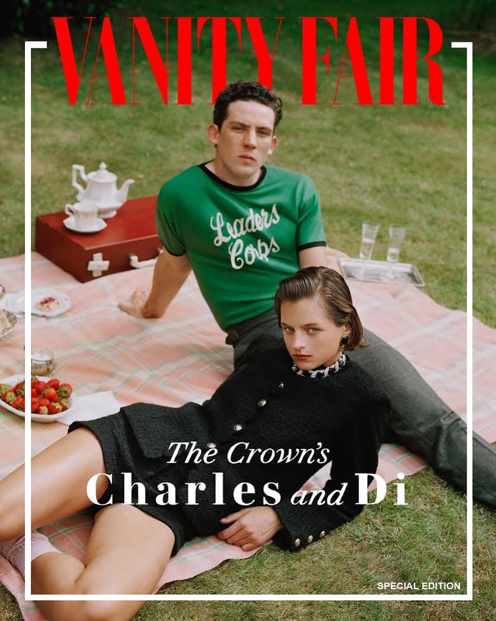 Vanity Fair cover featuring two young adult actors on a picnic blanket in a grassy field, with a teapot, snacks, and the magazine logo.