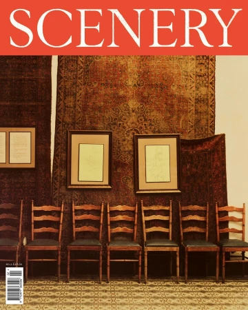 Magazine cover featuring chairs and framed artwork against a textured wall, under the title 'Scenery' in a bright red banner.