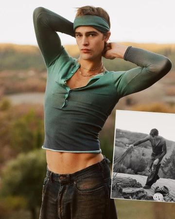 Male model poses outdoors wearing a green top and headband, against a blurred natural background and a black and white climber inset.