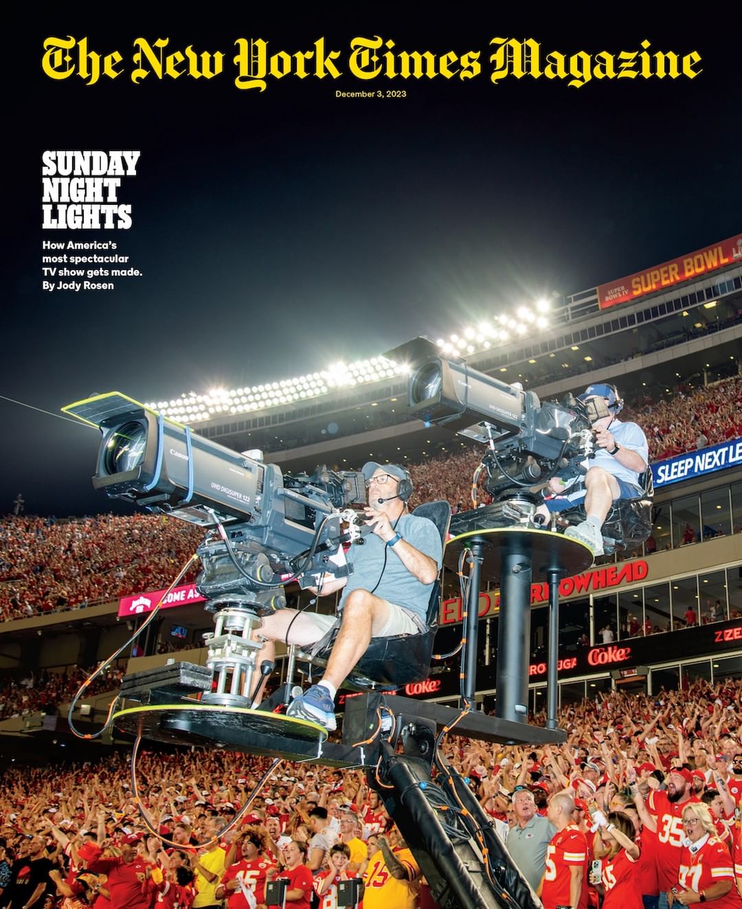 New York Times Magazine cover featuring two cameramen operating large television cameras at a stadium event with a cheering crowd.