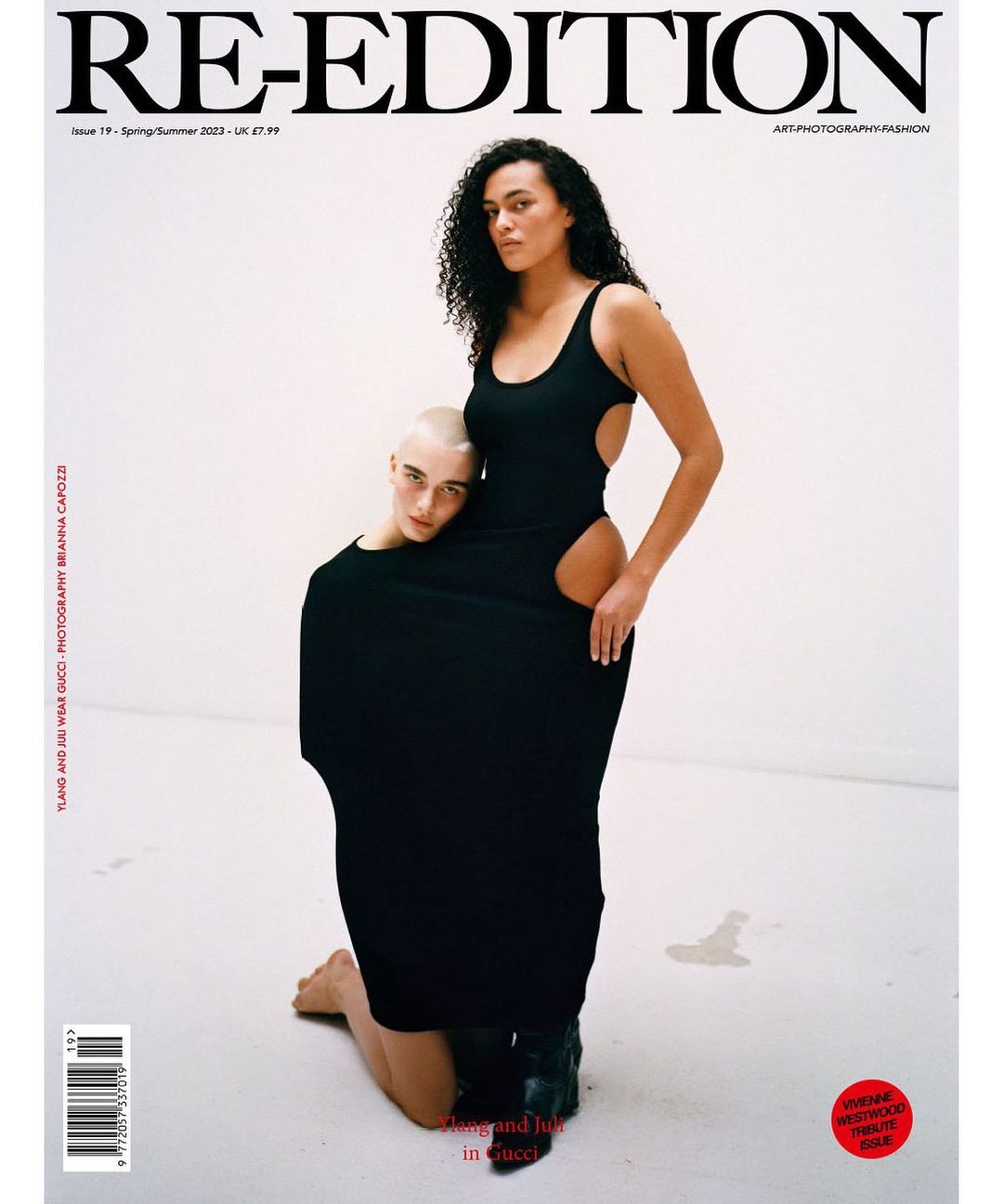 Magazine cover featuring two female fashion models in black clothing against a bright white backdrop, showcasing modern art and fashion.