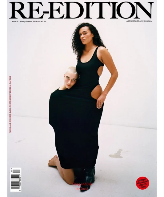 Magazine cover featuring two female fashion models in black clothing against a bright white backdrop, showcasing modern art and fashion.