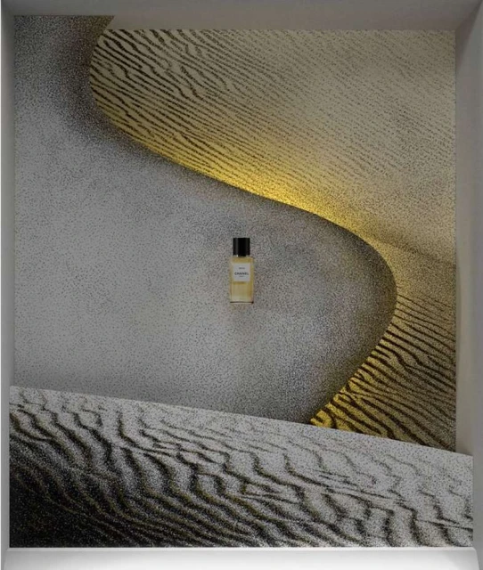 Perfume bottle on sand dune background, neutral color palette, product shot, minimalist style, elegant presentation for fragrance marketing.