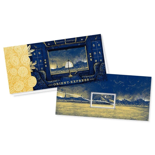 An image of two envelopes, one featuring a train interior with a view of Paris, and the other showing a landscape scene with Eiffel Tower.