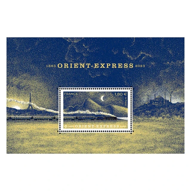 Illustration of the Orient Express train against a stylized landscape featuring the Eiffel Tower and mountains on a postage stamp.
