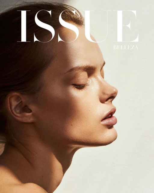 Close-up profile portrait of an adult woman with fair skin, featuring bright natural light, and the text 'ISSUE BELLEZA' on the magazine cover.