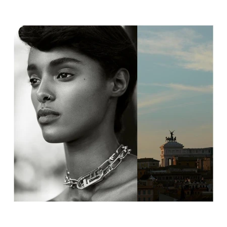 Close-up black and white portrait of a young woman with a chain link necklace, juxtaposed with a cityscape and cloudscape.