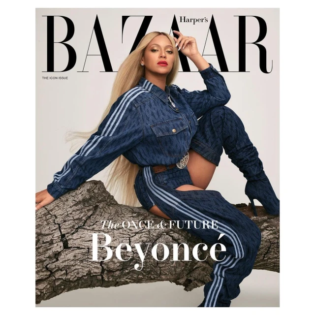 Harper's Bazaar cover featuring a model in a denim outfit, seated on a fallen tree, against a neutral backdrop. Fashion and editorial.