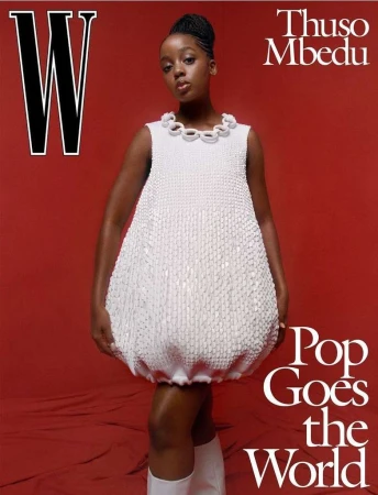 Magazine cover featuring Thuso Mbedu in a white dress, posing against a red background with the 'W' logo and text 'Pop Goes the World'.