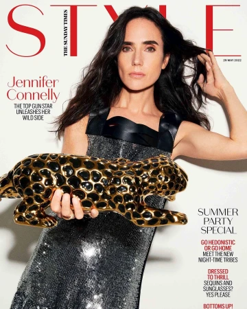 Magazine cover featuring Jennifer Connelly in a sequined dress, holding a golden jaguar statue, with 'The Sunday Times Style' masthead.