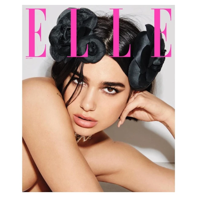 Elle magazine cover featuring a portrait of a woman with dark hair and a floral headpiece, close-up shot with magazine masthead.