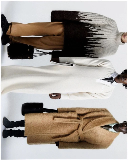 Three models showcase fall fashion in a studio setting: knit sweater, long cream dress, and tan coat, capturing elegant seasonal styles.