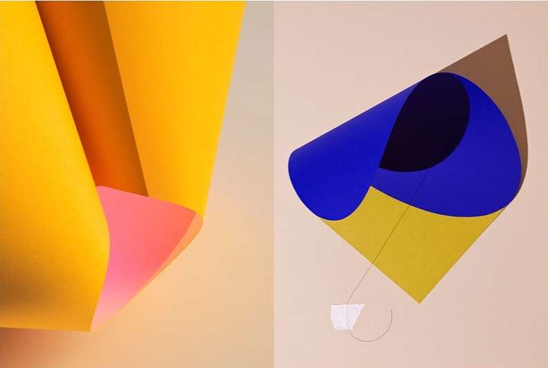 Abstract split-screen image featuring yellow and pink folded paper on the left and a blue and yellow paper sculpture on the right.