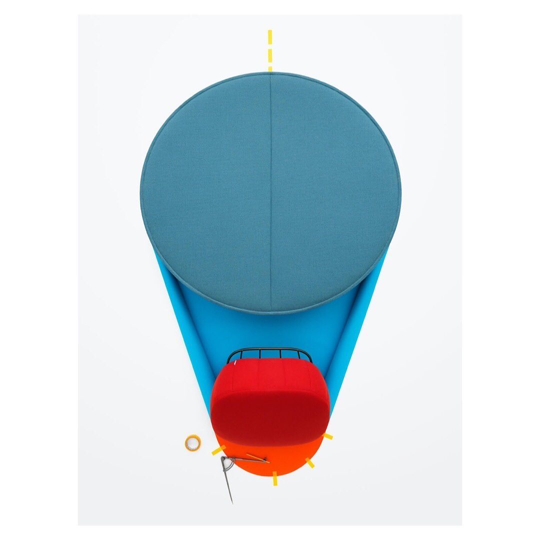 Stylized hot air balloon graphic with blue and red spheres and a light blue geometric shape, creating a whimsical and artistic composition.