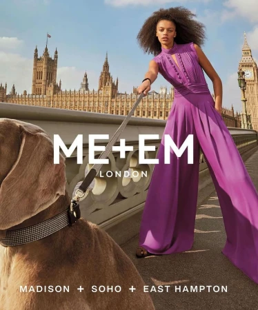 Fashion shot in London featuring a model in a purple jumpsuit walking a dog with the Houses of Parliament and Big Ben in the background.