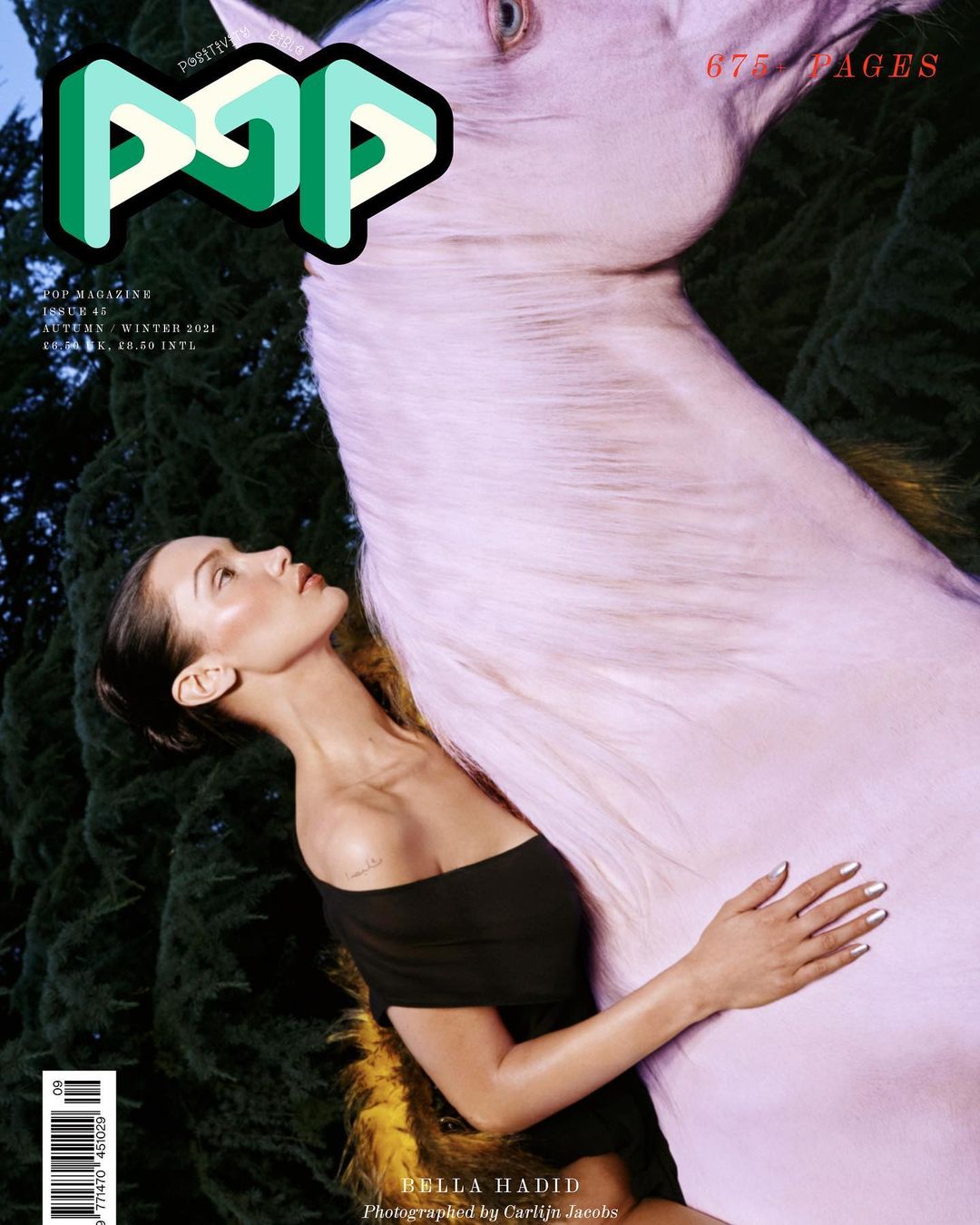 Magazine cover featuring Bella Hadid and a light purple horse, set against a dark green background, with 'POP' logo.