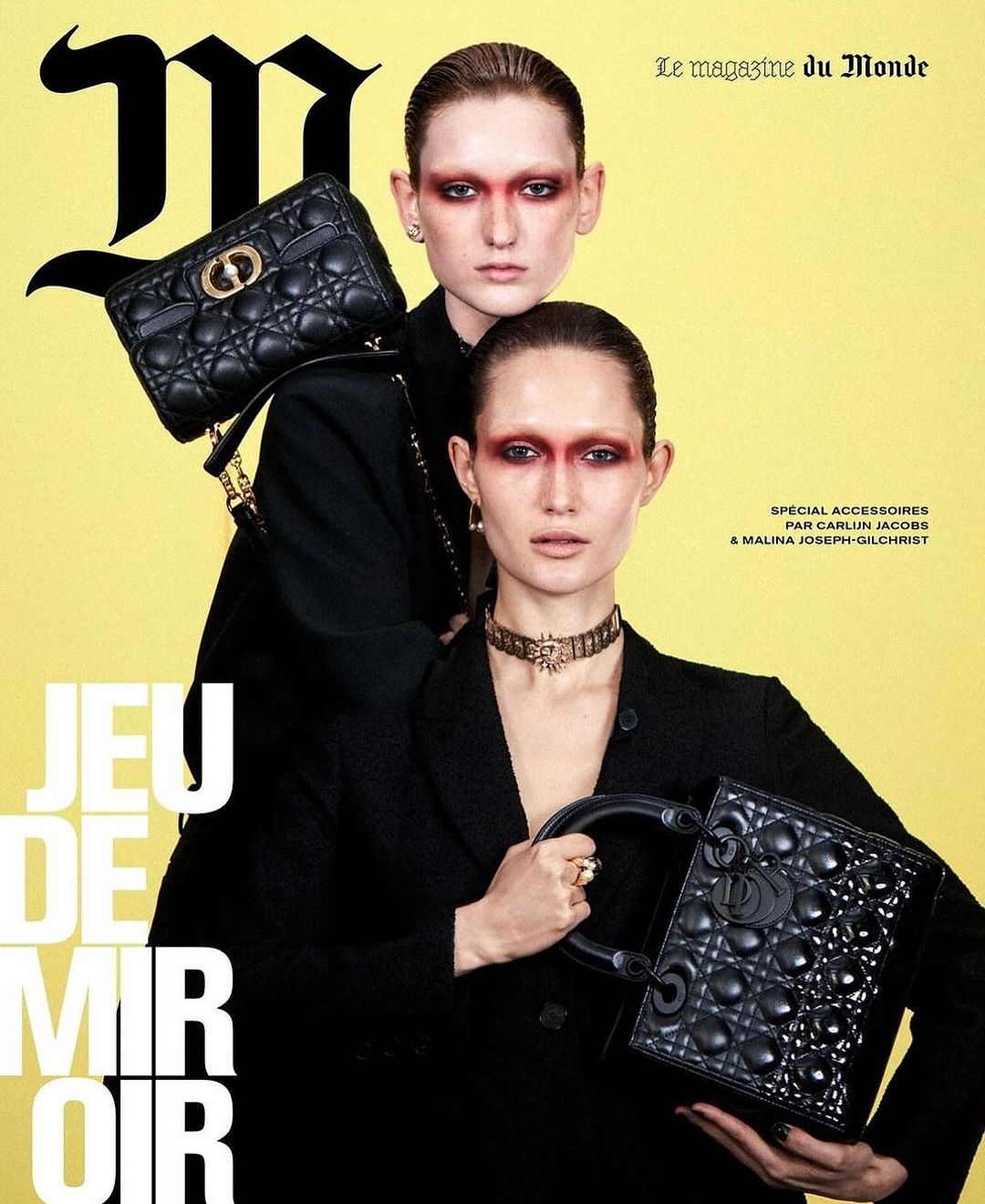 Fashion editorial cover featuring two women in black jackets holding quilted handbags against a yellow background with magazine text.