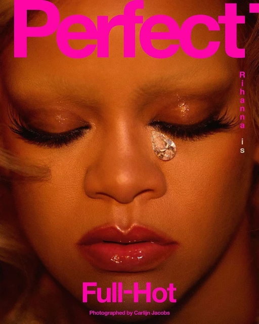 Magazine cover featuring a close-up portrait of Rihanna with dramatic eye makeup and a large gem teardrop. Hot pink logo and text.