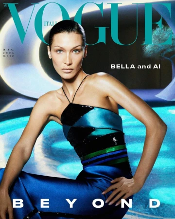 Vogue Italia cover featuring Bella Hadid in a blue and black strapless dress, seated against an abstract blue and white background.