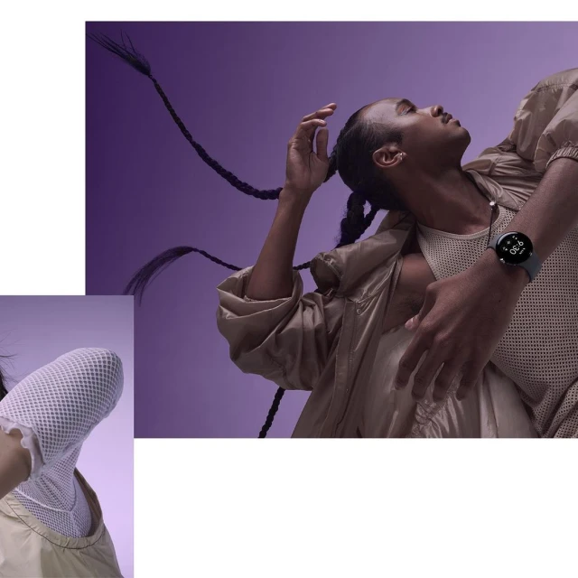 Woman with long braids wears a smartwatch on a purple background. The watch displays the time, and she wears a tan jacket.