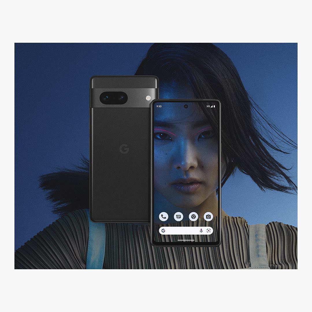 Two Google Pixel phones, one gray and one on showing a woman's face, displayed against a blurred navy background.