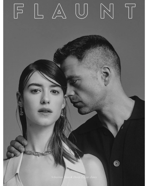 Black and white portrait of a man and a woman posing close together, featuring the magazine title FLAUNT in large white letters at the top.