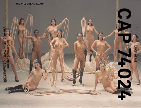 Eleven women pose nude in a photo studio, holding tan cords, with black text overlay, in an image promoting Carlota Guerrero and Casey Cadwallader.