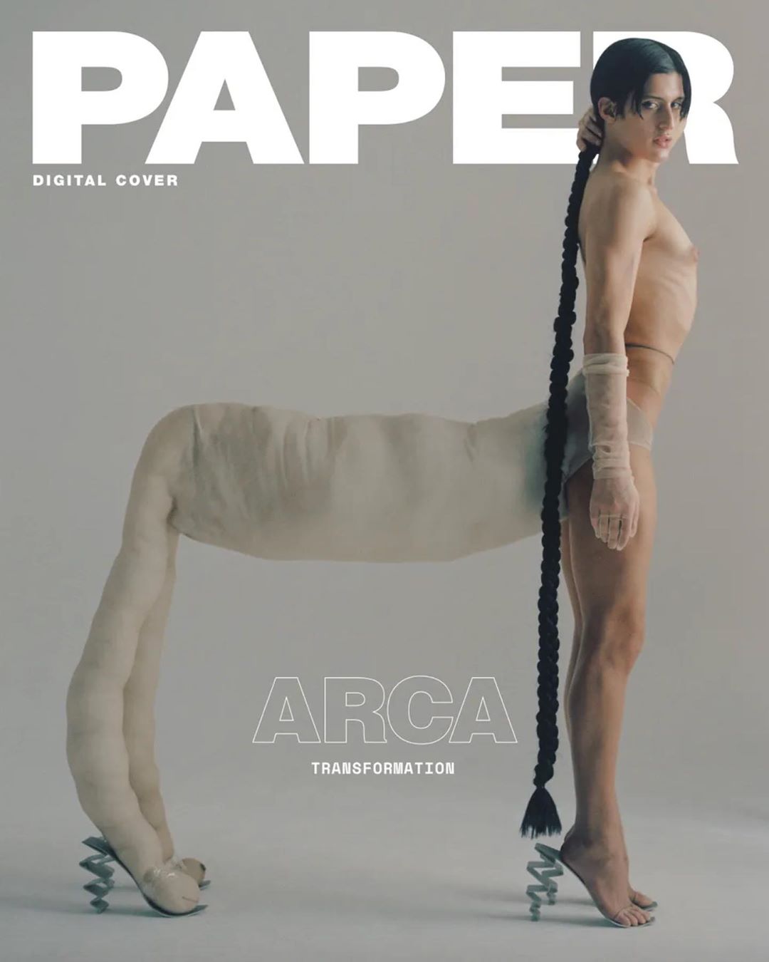 Paper Magazine cover featuring a person with a long braid and a horse-like body, blending human and animal features in a studio setting.