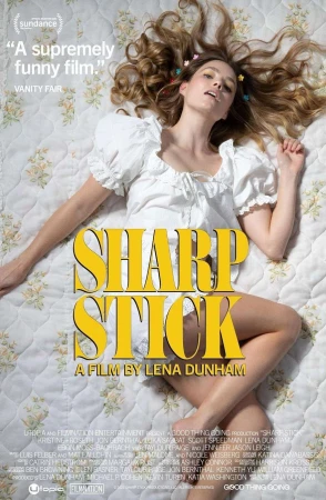 Movie poster for Sharp Stick featuring a woman lying on a bed with a floral-patterned quilt, looking up at the camera with a smirk.