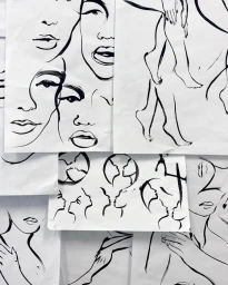 Collage of black ink line drawings on white paper depicting abstract faces, bodies, and kissing profiles by Caroline Tomlinson.