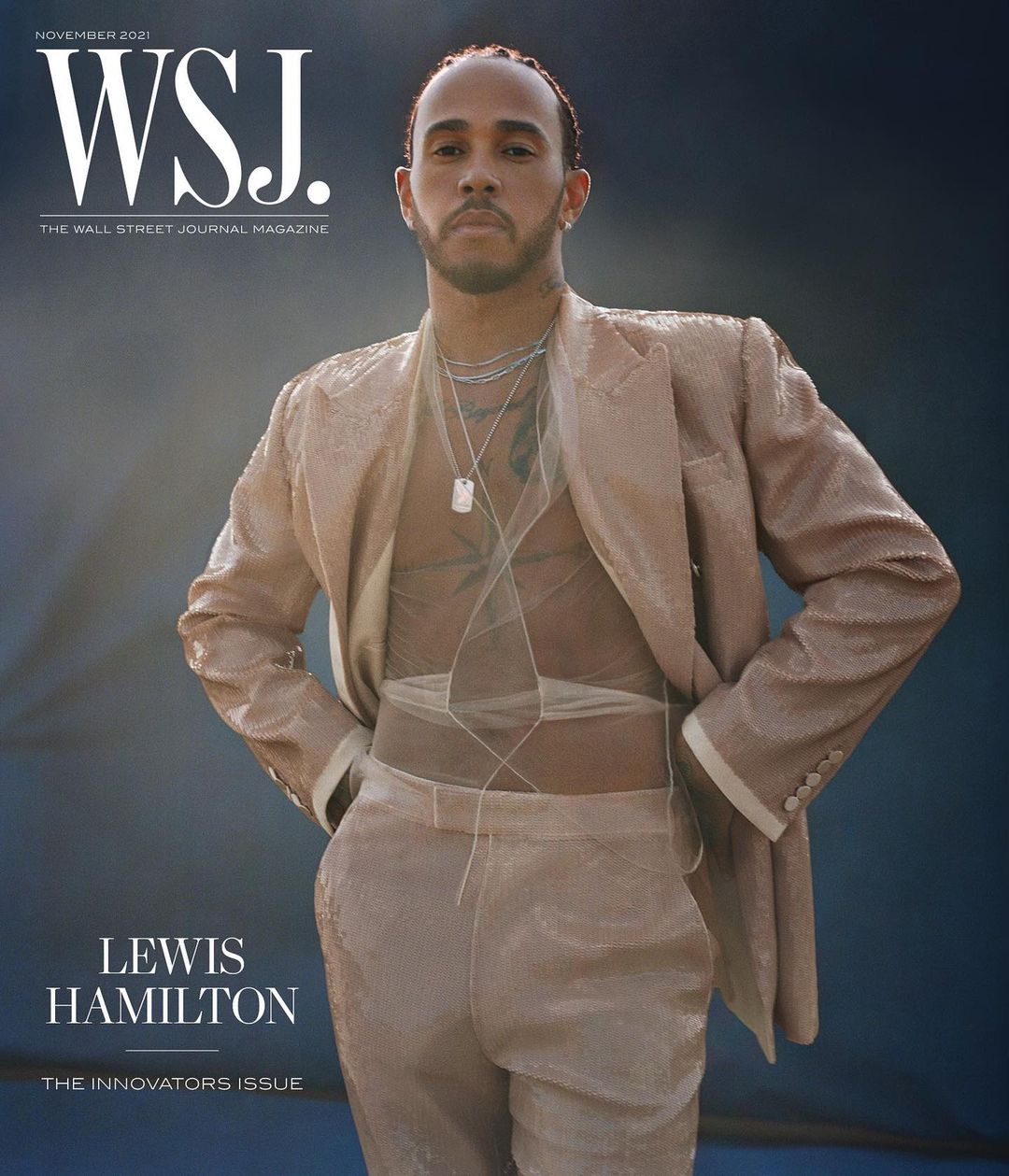 Magazine cover featuring Lewis Hamilton in a sequined suit and jewelry, against a blue backdrop for WSJ. Magazine's November 2021 issue.