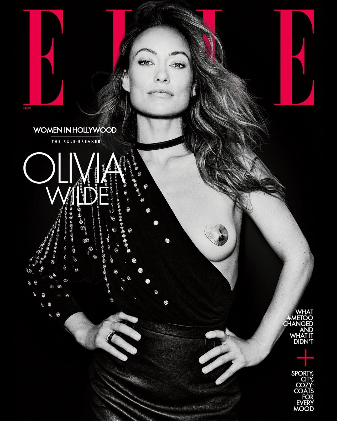 Olivia Wilde covers ELLE Women in Hollywood, wearing a black top and skirt against a black background with red letters.   